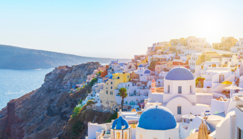 The coast of Santorini in Greece at sunrise.