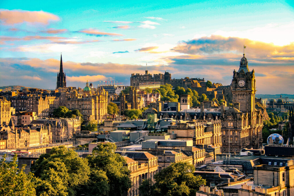 Historic cobblestone streets in Edinburgh Old Town with traditional stone buildings and Scottish architecture