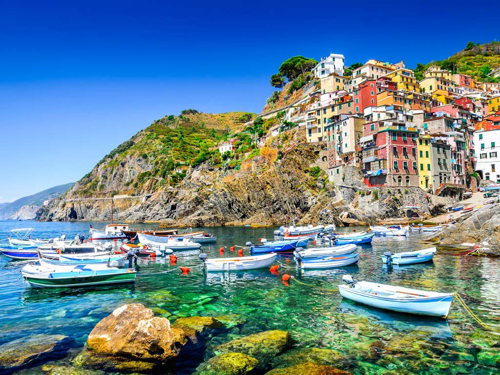 Colorful coastal village and rugged coastline in Cinque Terre Italy